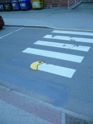 Pac Man eating street paint